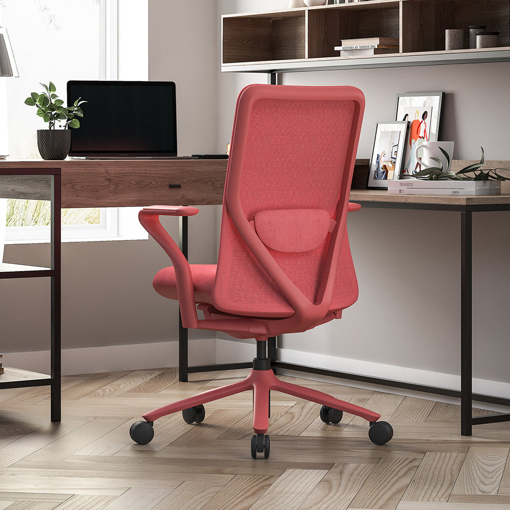Ergonomic mesh office chair in Coral lifestyle scene
