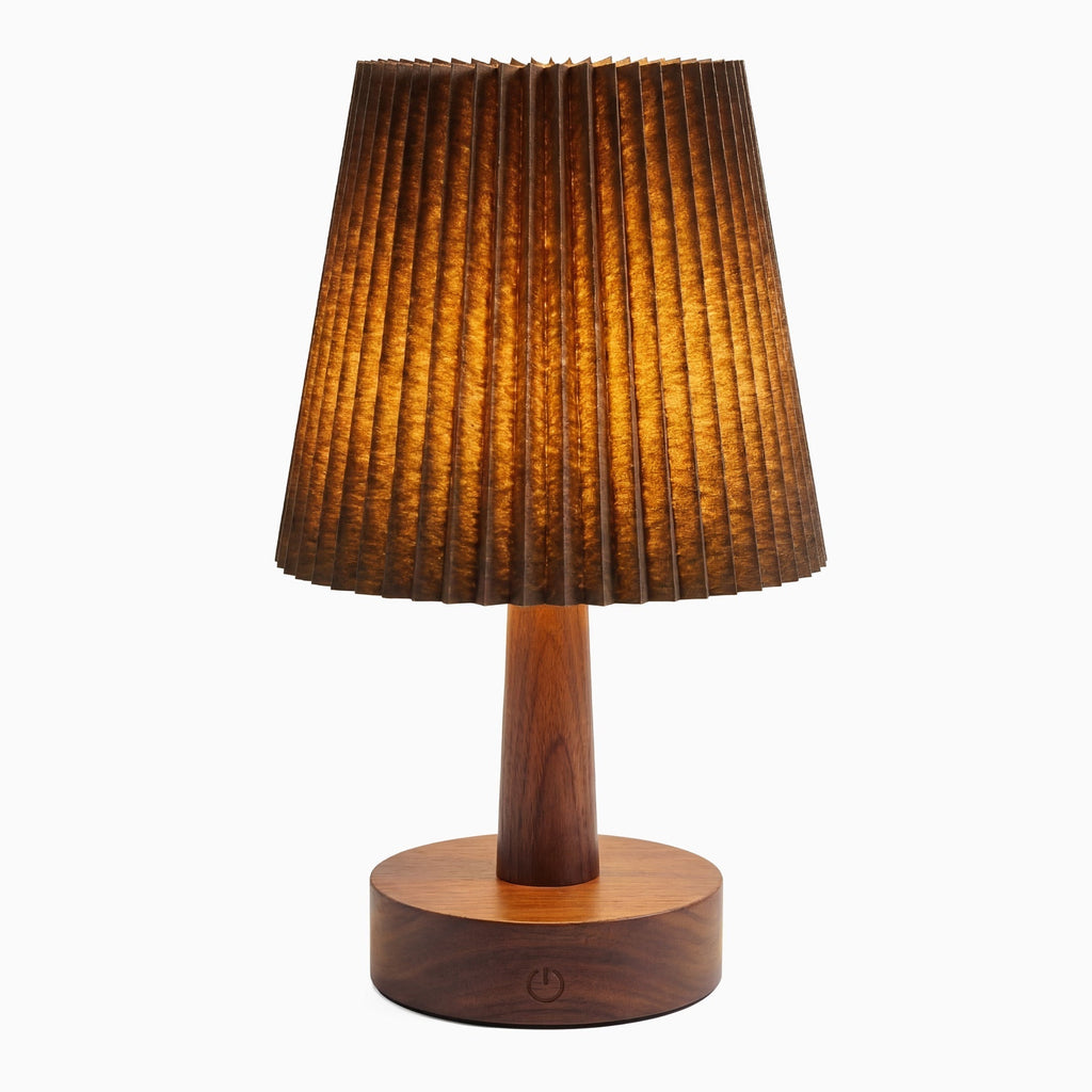 Walnut stained Ripple wooden desk lamp illuminated